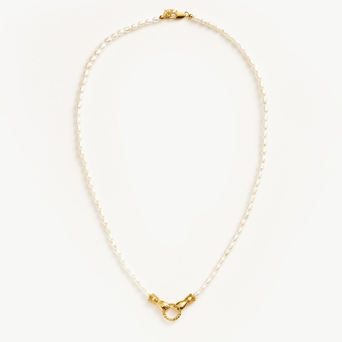 Unity Pearl Bracelet with clasped hands pendant and freshwater pearls, symbolizing trust and connection — designed by MiaPromise.