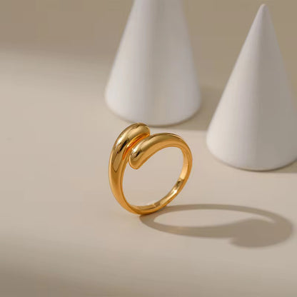 Muse Curve Ring in 18k gold plated finish with sculptural open design and rounded ends