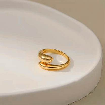 Muse Curve Ring in 18k gold plated finish with sculptural open design and rounded ends