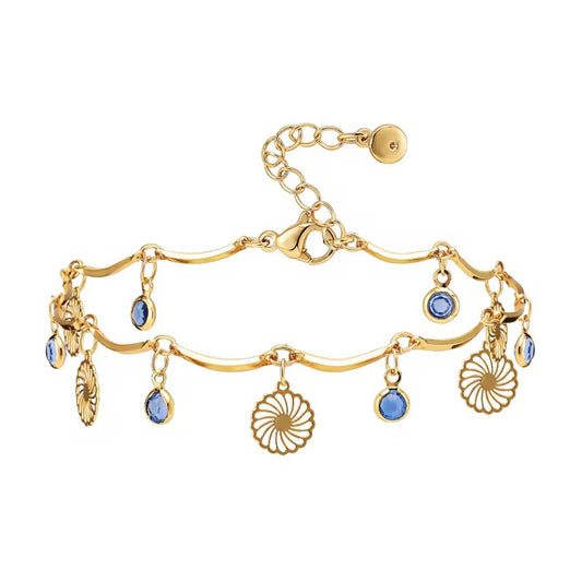 Blue Horizon Charm Anklet with ocean blue crystals and gold floral charm on wave chain 00051