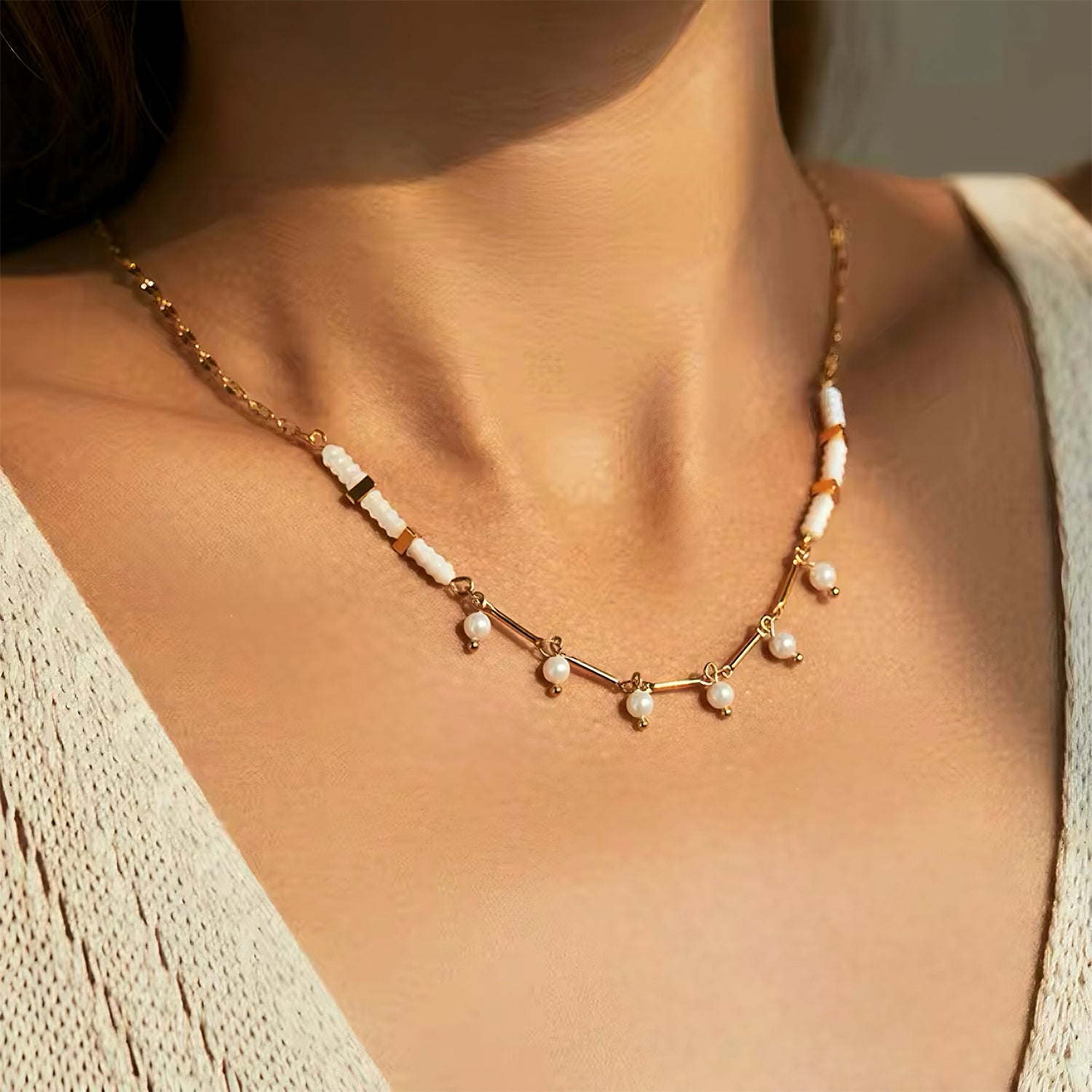 Elysian pearl necklace with 14K gold plating, white and coral beads, and dangling natural pearls 00003