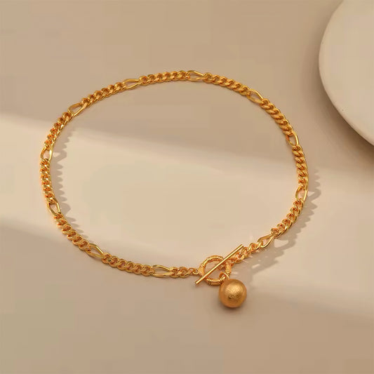 Golden Orb Toggle Chain Necklace with matte gold pendant and minimalist T-bar clasp – Mia Promise Jewelry 00061