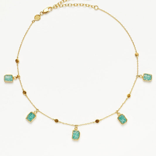 Isla Drops Necklace with turquoise-blue pendants and gold dotted chain, inspired by island light and coastal rhythm — designed by MiaPromise.