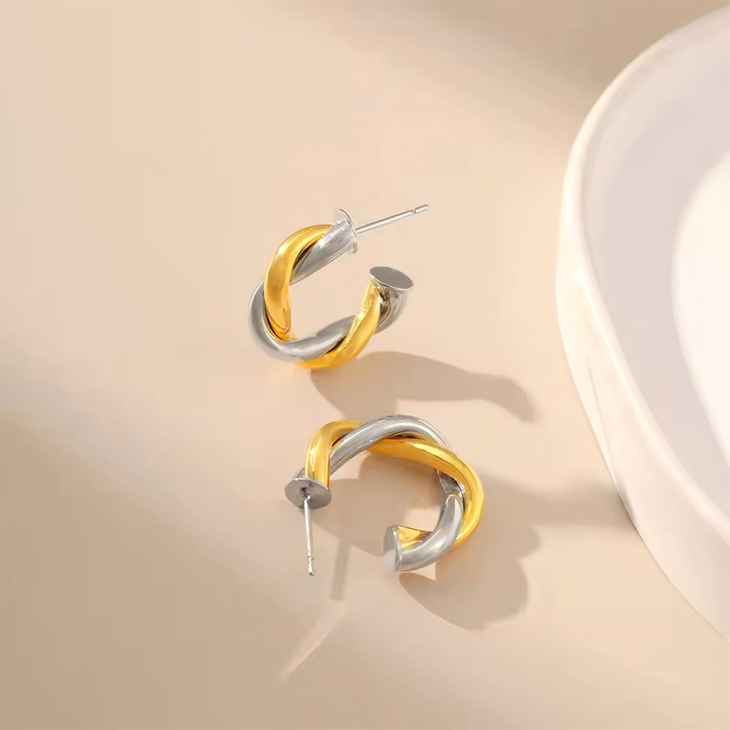 Gold and silver twisted hoop earrings inspired by the moon and sun, celestial design with timeless elegance  00041