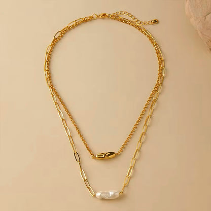 Layered gold necklace with freshwater pearl and dual chain design 00014