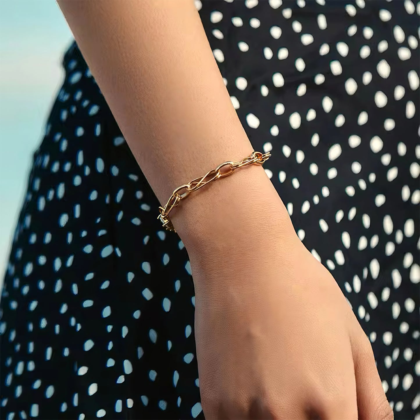 Gold link bracelet with infinity ring and five cubic zirconia stones, bold and elegant layered design 00024