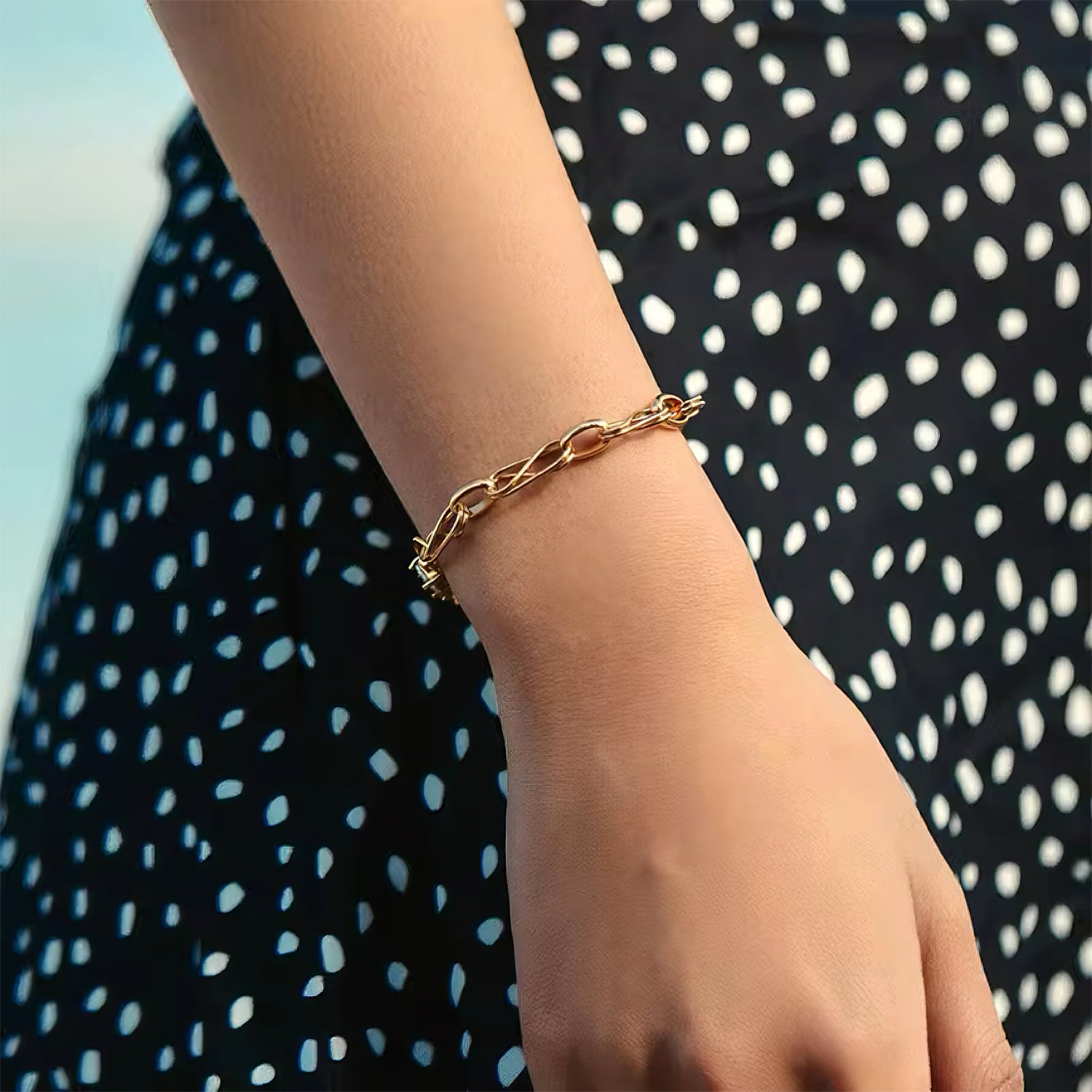 Gold link bracelet with infinity ring and five cubic zirconia stones, bold and elegant layered design 00024