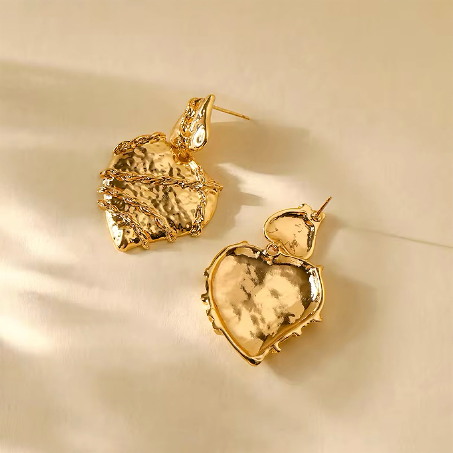 Molten heart-shaped gold statement earrings with sculptural texture and high-shine finish – Mia Promise Jewelry 00057