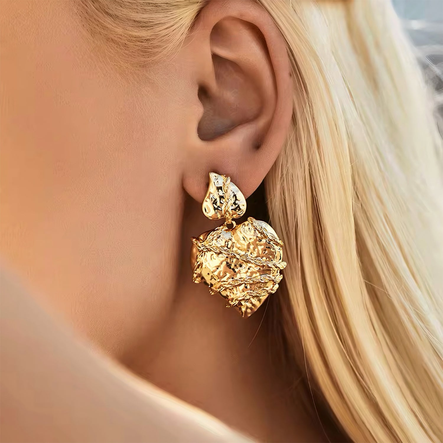 Molten heart-shaped gold statement earrings with sculptural texture and high-shine finish – Mia Promise Jewelry 00058