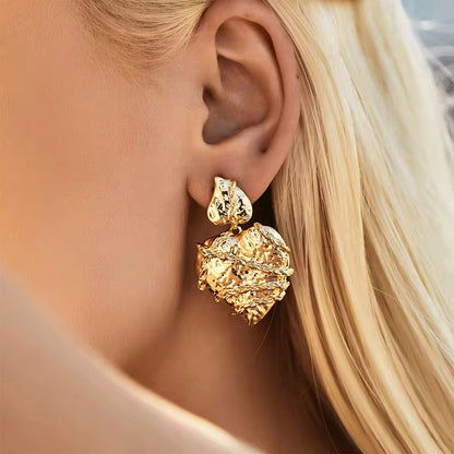 Molten heart-shaped gold statement earrings with sculptural texture and high-shine finish – Mia Promise Jewelry 00058