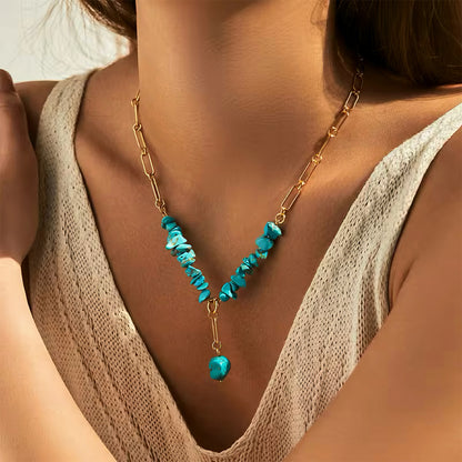 Turquoise Harmony Necklace with vibrant turquoise stones on a delicate gold chain, symbolizing tranquility and creativity  000006