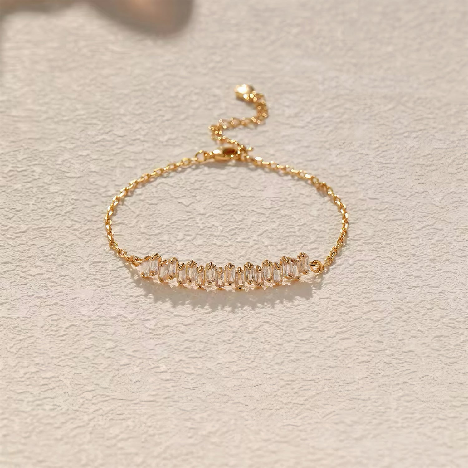 Gold chain bracelet with baguette-cut crystals, delicate and stackable design for everyday sparkle 00035