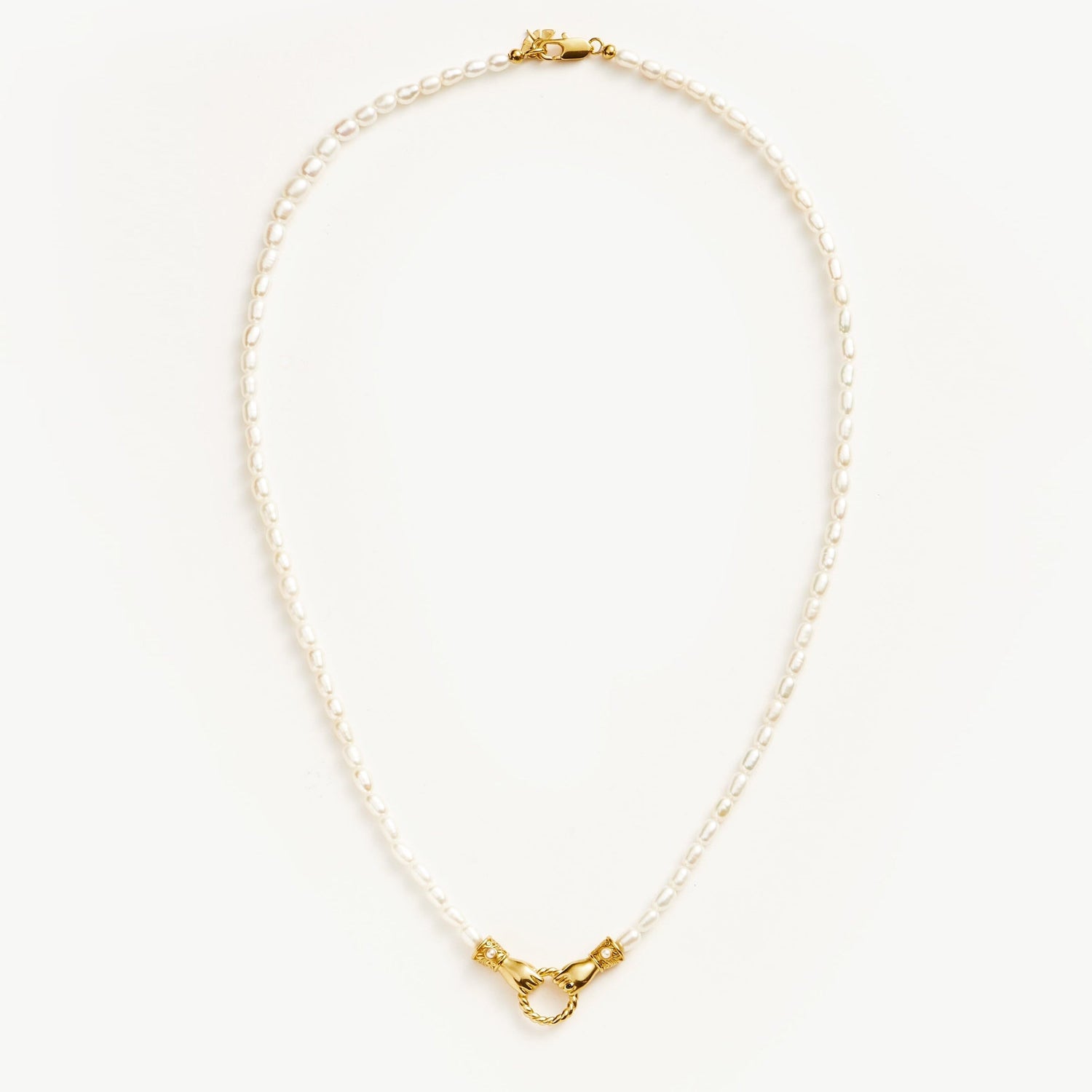 Unity Pearl Bracelet with clasped hands pendant and freshwater pearls, symbolizing trust and connection — designed by MiaPromise.