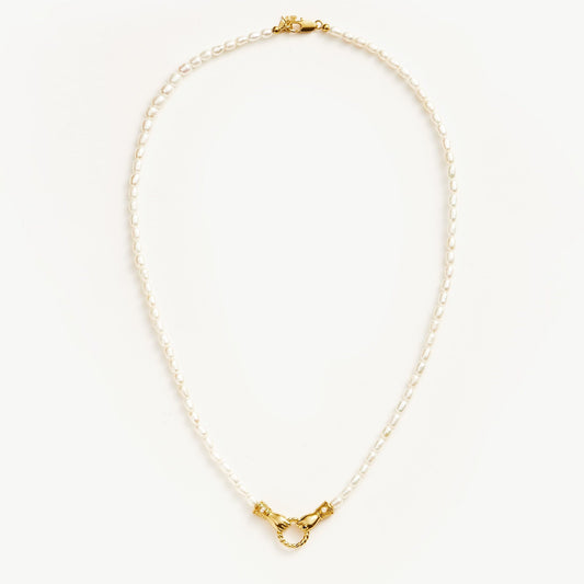 Unity Pearl Bracelet with clasped hands pendant and freshwater pearls, symbolizing trust and connection — designed by MiaPromise.