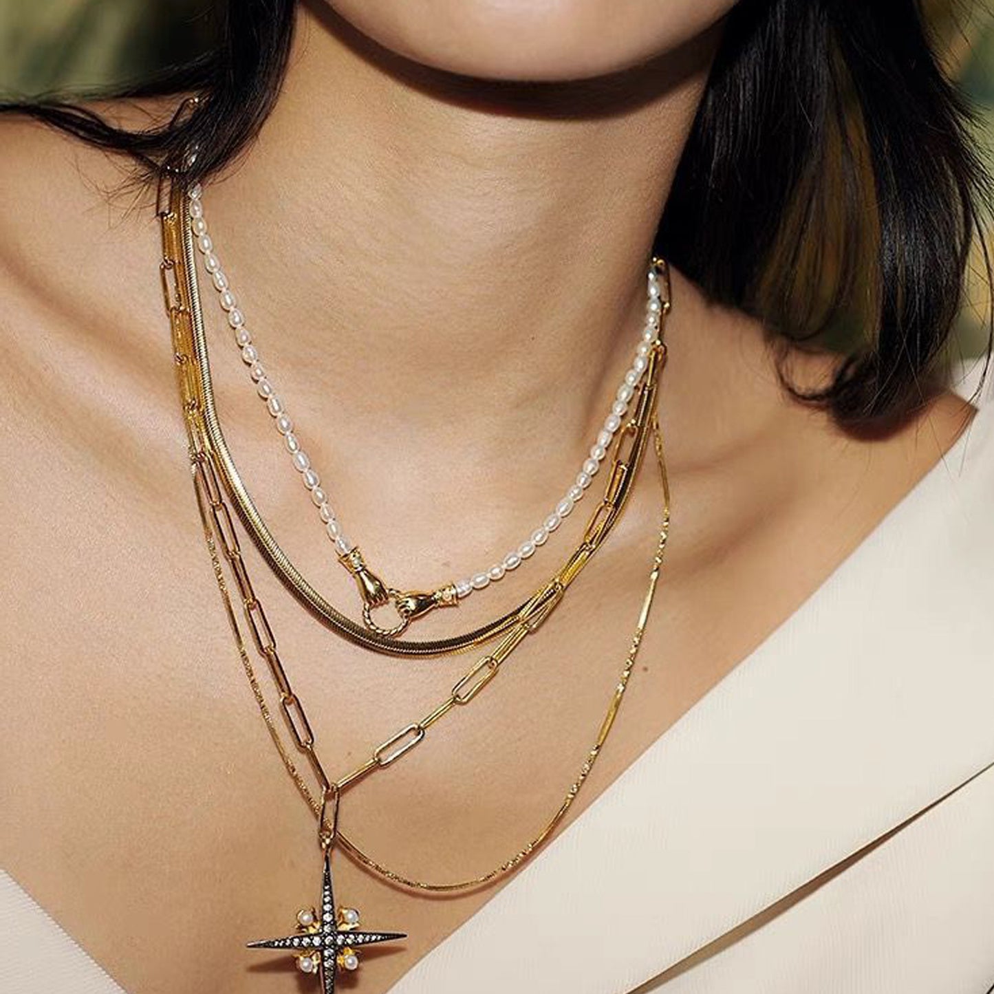 Unity Pearl Bracelet with clasped hands pendant and freshwater pearls, symbolizing trust and connection — designed by MiaPromise.