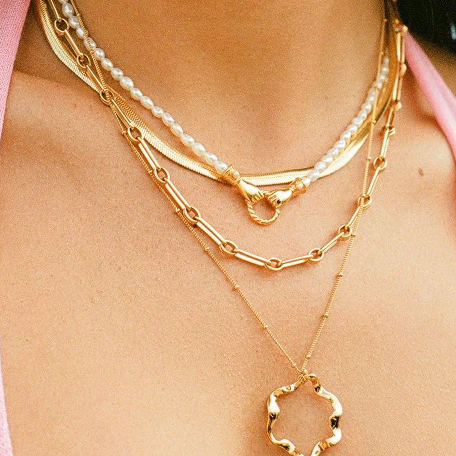 Unity Pearl Bracelet with clasped hands pendant and freshwater pearls, symbolizing trust and connection — designed by MiaPromise
