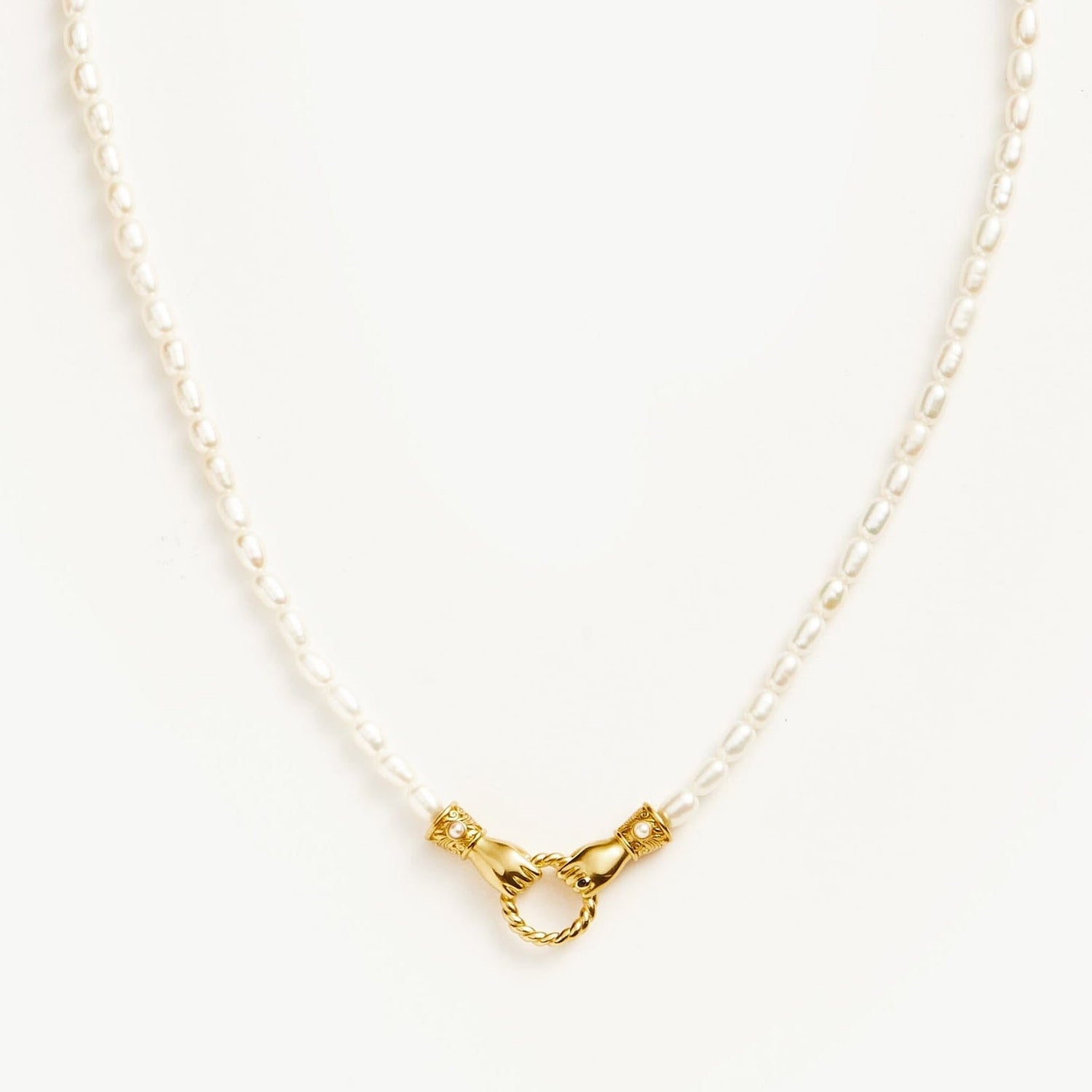 Unity Pearl Bracelet with clasped hands pendant and freshwater pearls, symbolizing trust and connection — designed by MiaPromise